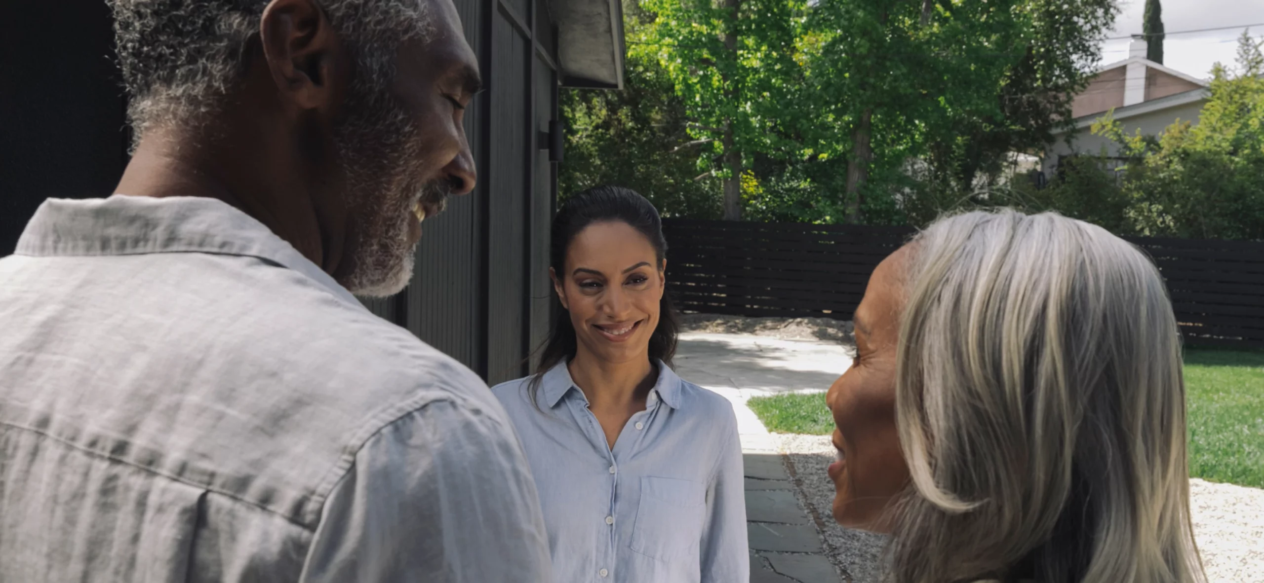 Modern eco-friendly home equipped with solar panels on the roof, illuminated in the tranquil twilight.
